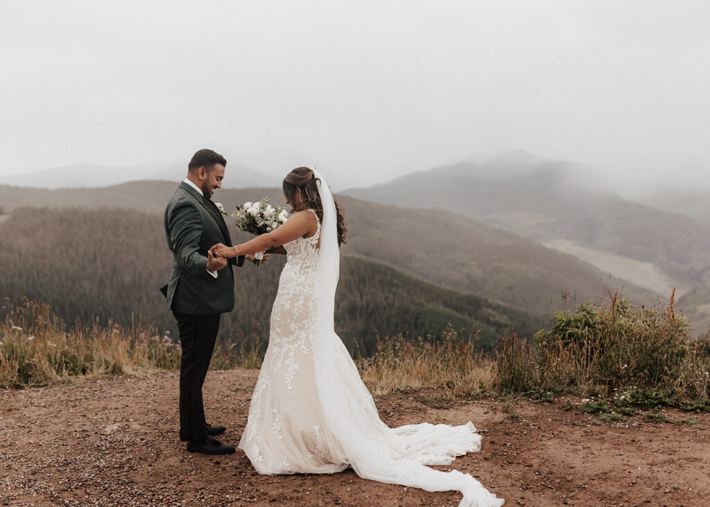 Bride and Groom's first look on their wedding day atop Vail Mountain in CO.