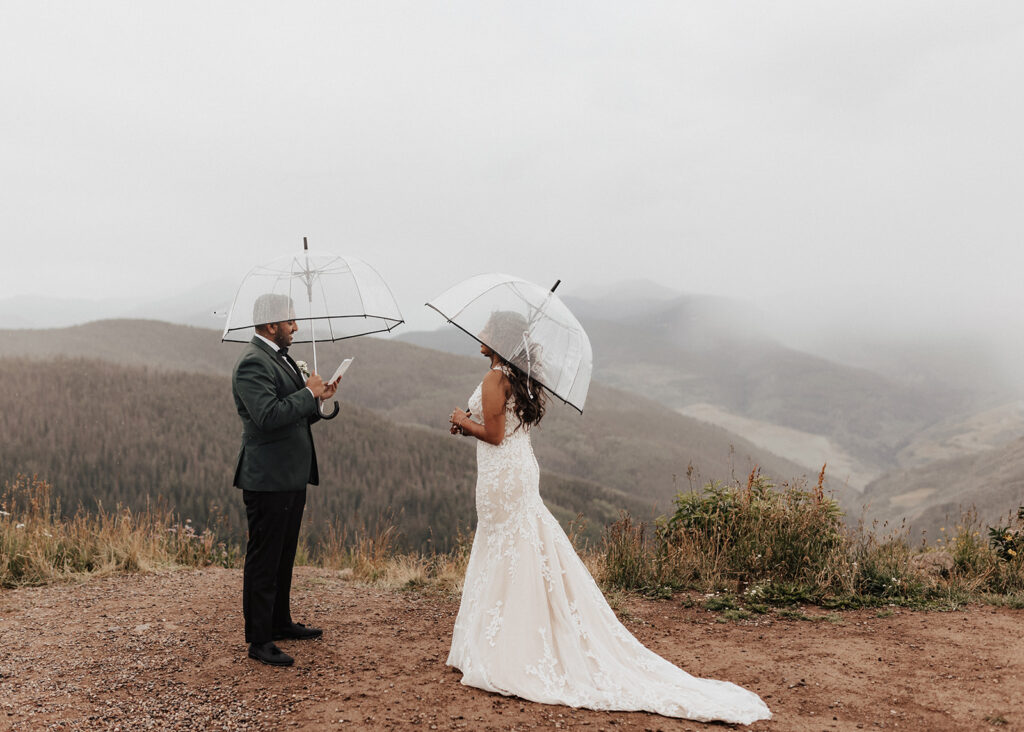 Bride and groom share personal vows atop Vail Mountain in Colorado.