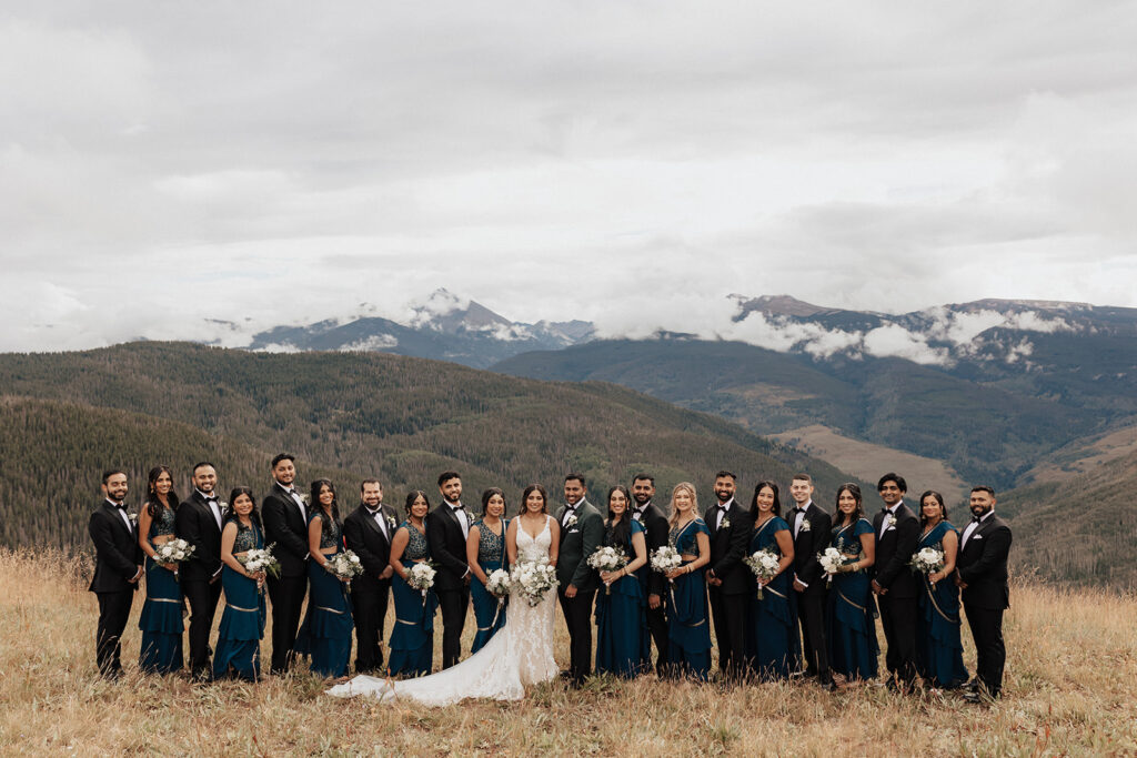 Wedding party portrait atop Vail Mountain in Colorado.