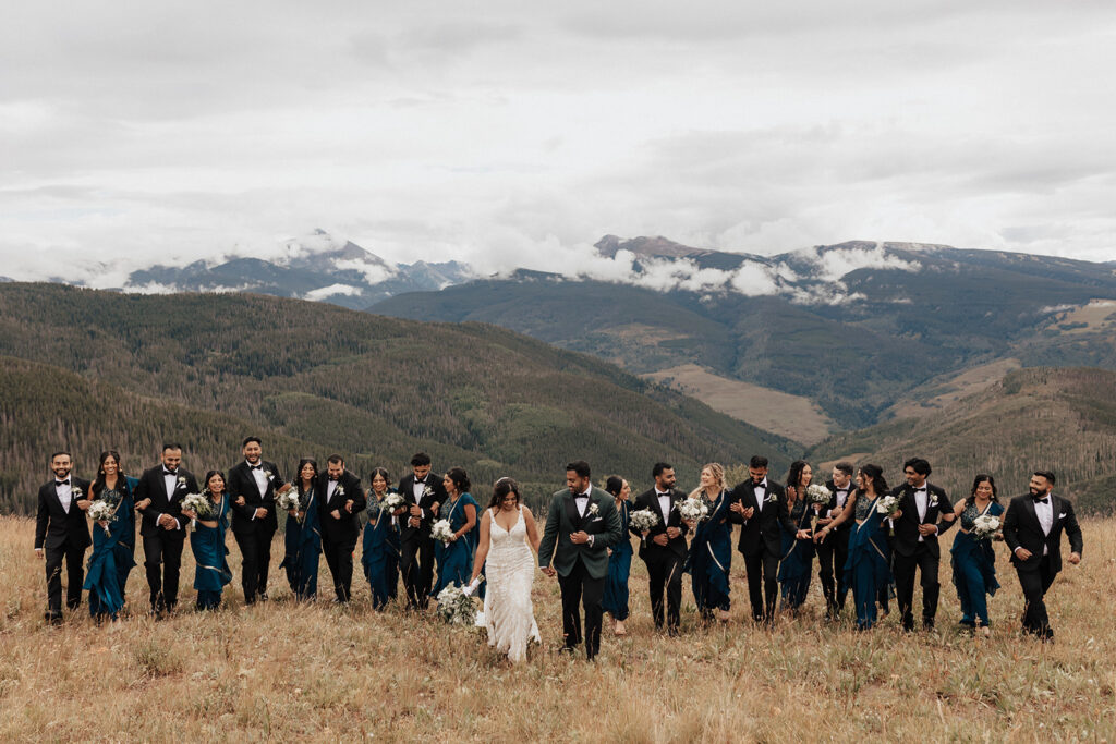 Wedding party portrait atop Vail Mountain in Colorado.