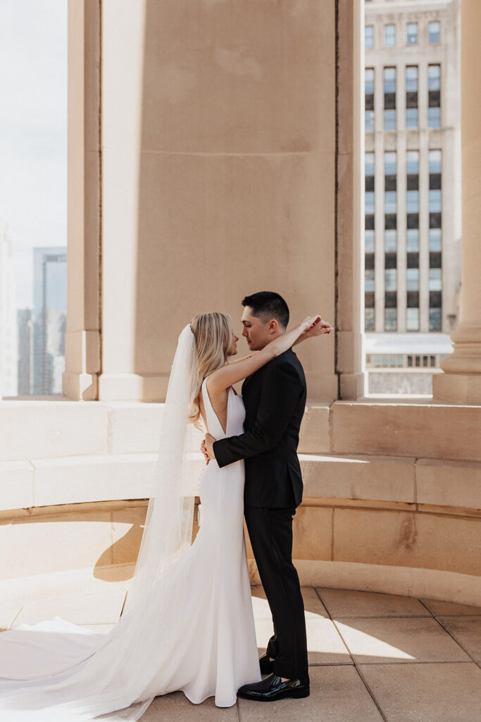 Bride and groom portrait atop The LondonHouse Chicago
