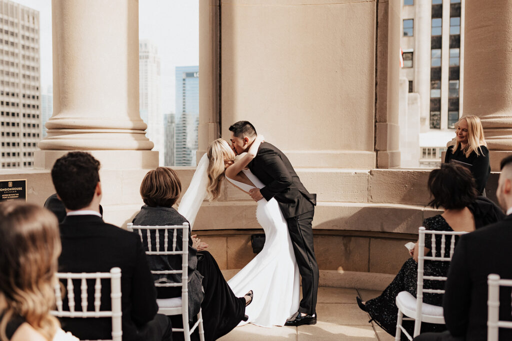Bride and groom's first kiss at The LondonHouse Chicago