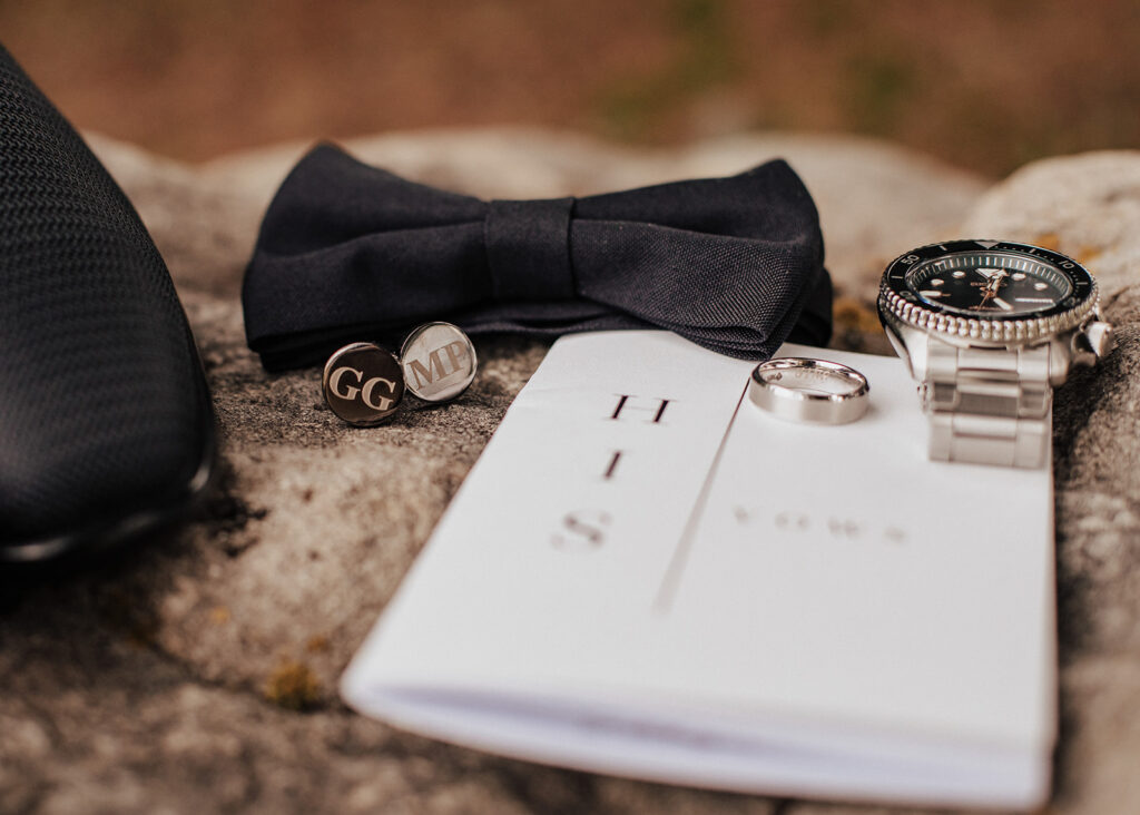 Groom's custom engraved cufflinks on wedding day in Vail, CO.