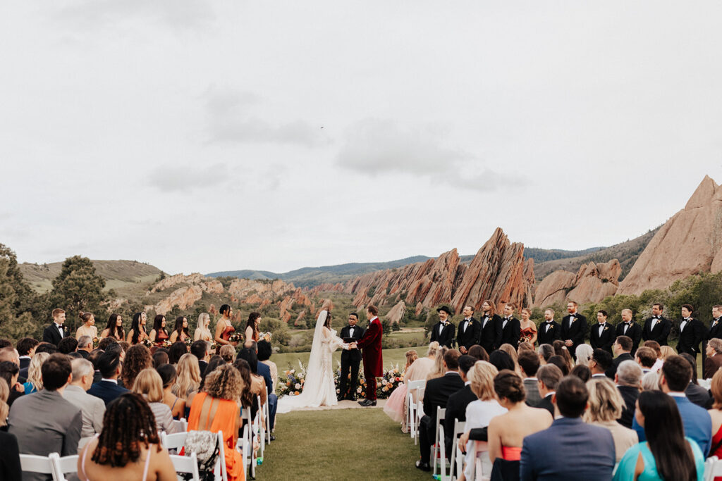 Colorful Colorado wedding ceremony at Arrowhead Golf Course
