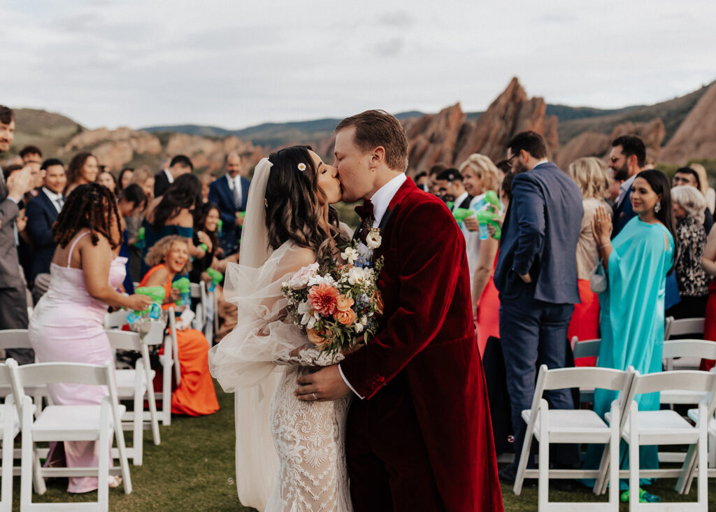 Colorful Colorado wedding ceremony at Arrowhead Golf Course