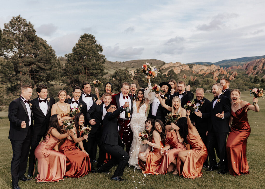 Colorful wedding party at Arrowhead Golf Course in Colorado