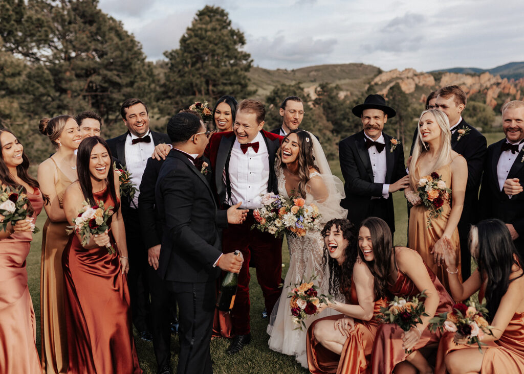 Colorful wedding party at Arrowhead Golf Course in Colorado