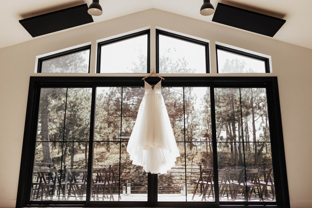 Wedding dress hanging in The Lofthouse