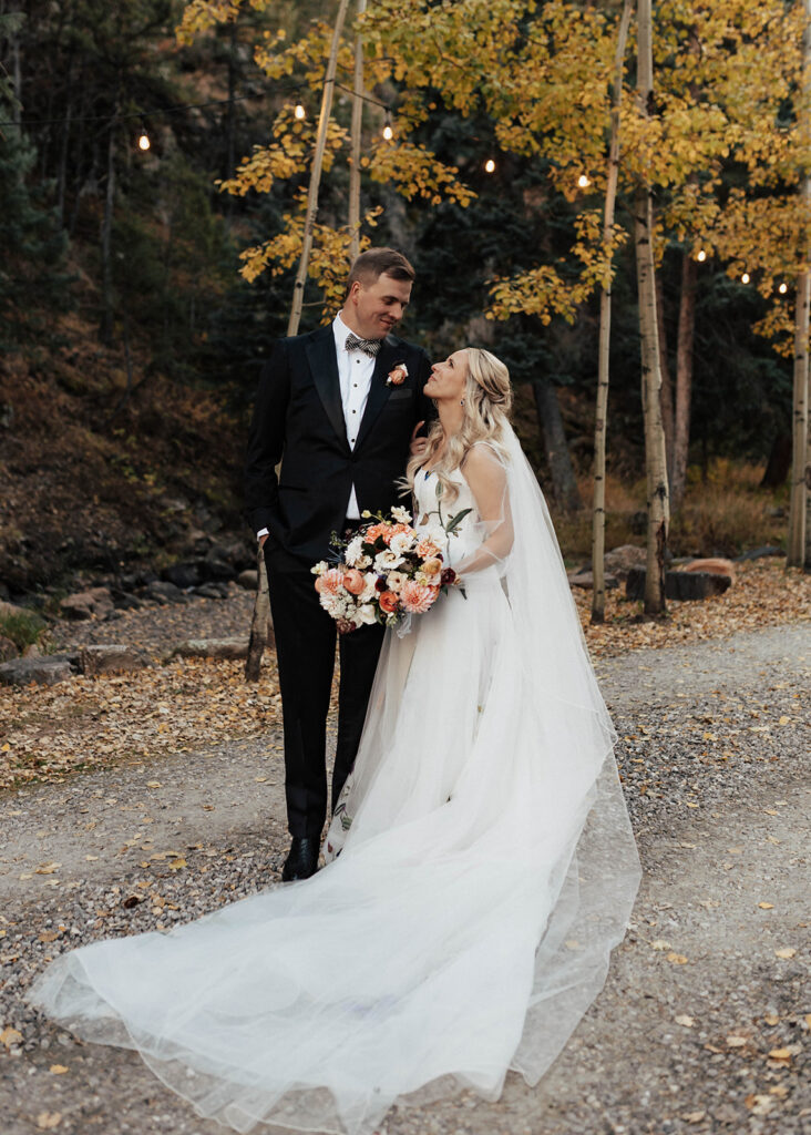 Bride and Groom portraits at Blackstone Rivers Ranch in Idaho Springs, CO. 