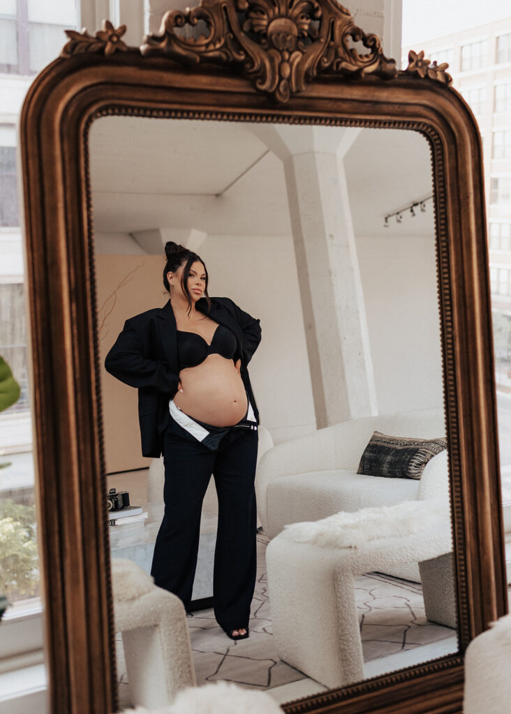 Pregnant woman posing for editorial maternity portraits in Chicago.