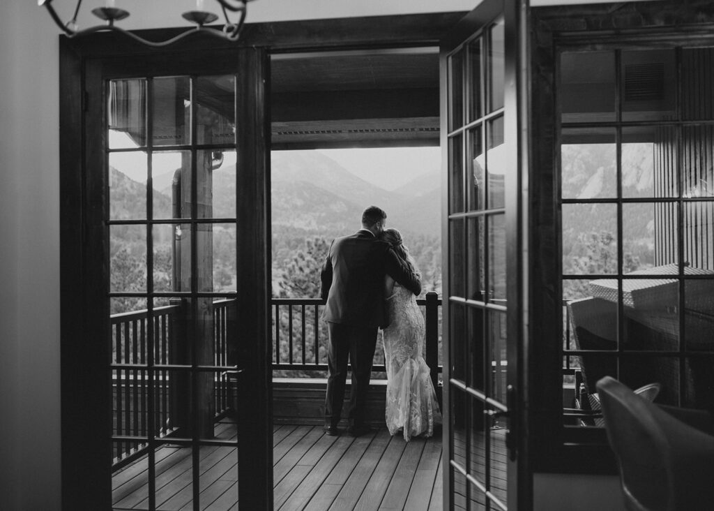 Bride and groom enjoying views of the Rocky Mountains at Black Canyon Inn