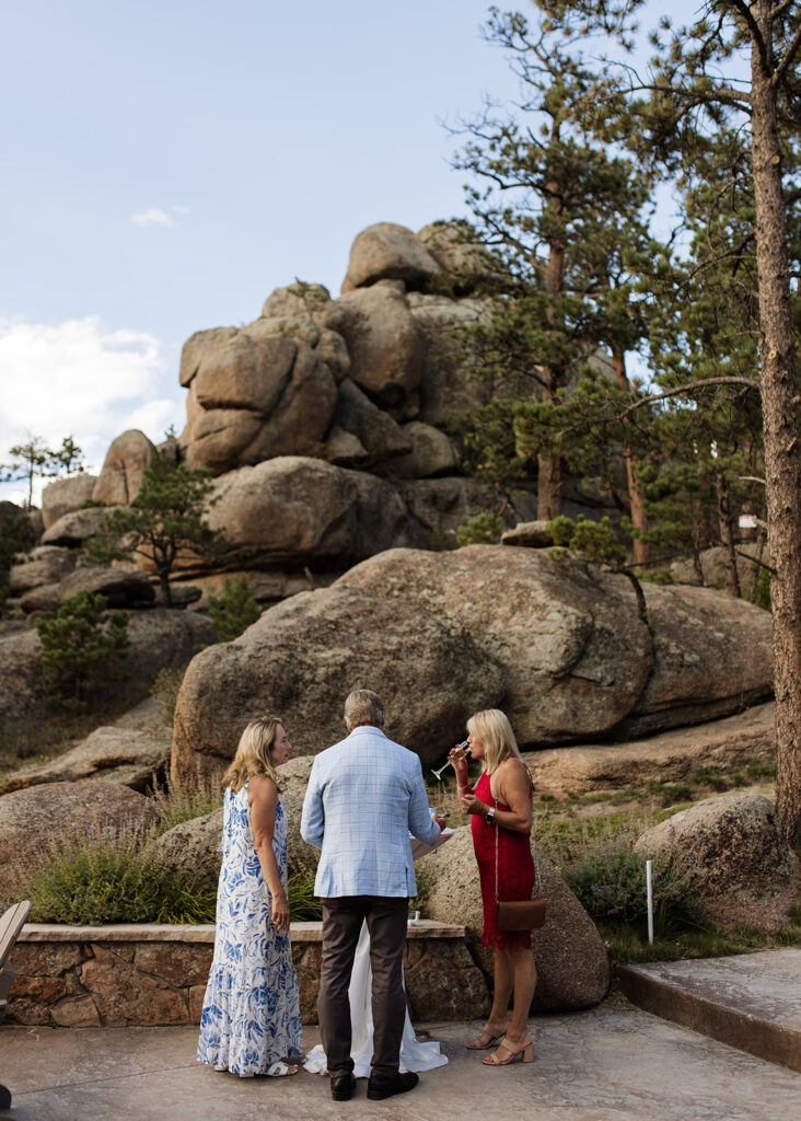 Guests mingling during cocktail hour at The Boulders at Black Canyon Inn