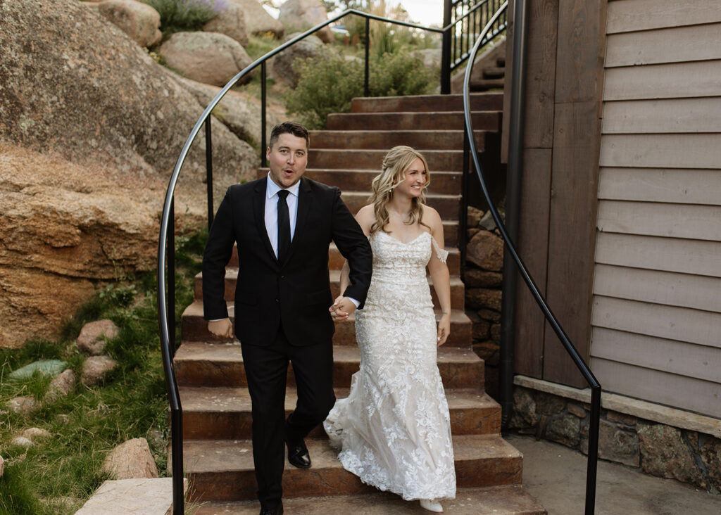Bride and groom entering cocktail hour at Black Canyon Inn in Estes Park, CO