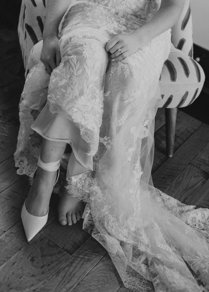Brides shoes and dress detail