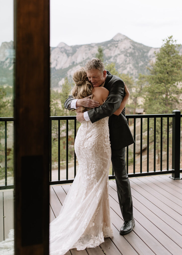 Brides first look with her Dad at Black Canyon Inn in Estes Park, CO