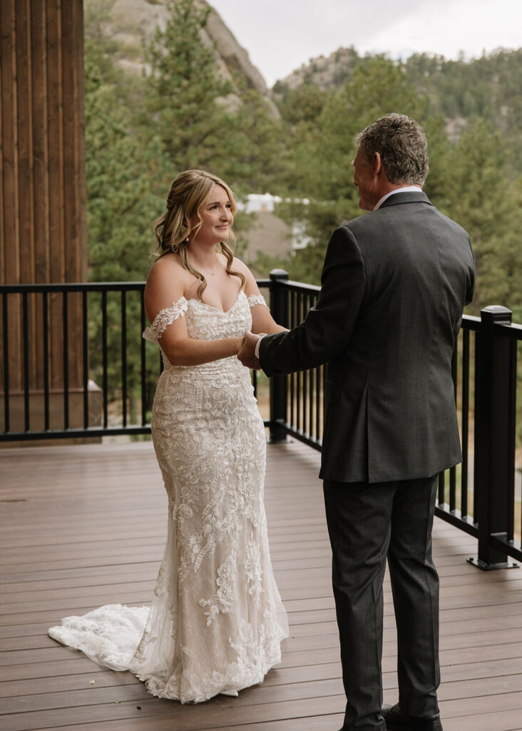 Brides first look with her Dad at Black Canyon Inn in Estes Park, CO