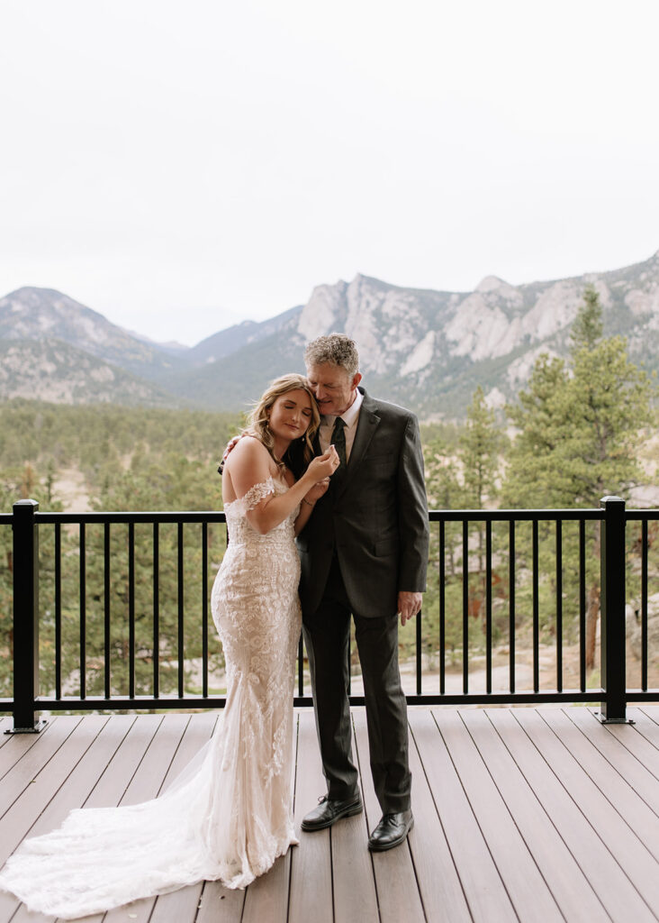 Brides first look with her Dad at Black Canyon Inn in Estes Park, CO